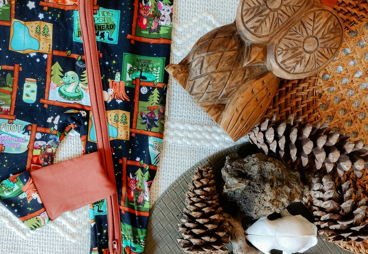 Camp Cryptids Zippered Romper